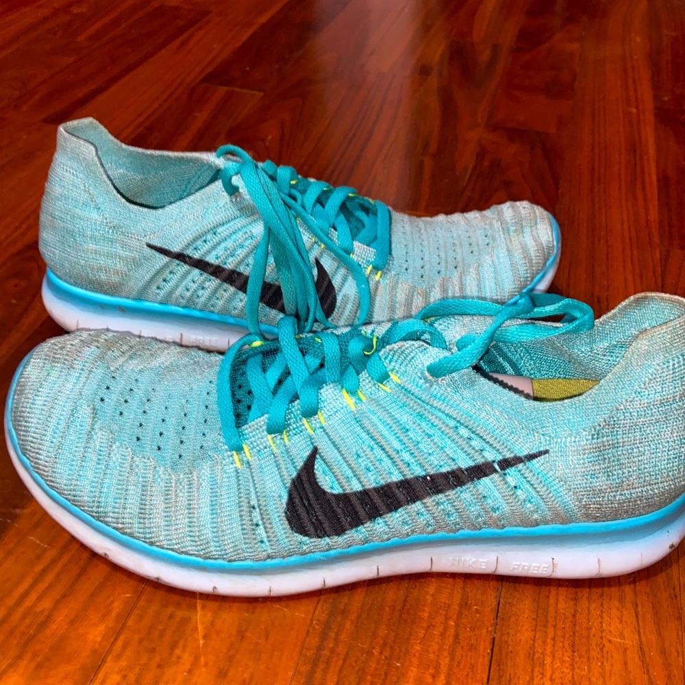 Nike free run shoes.